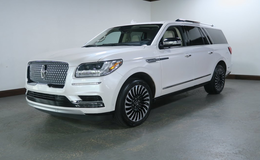 white Range Rover side view